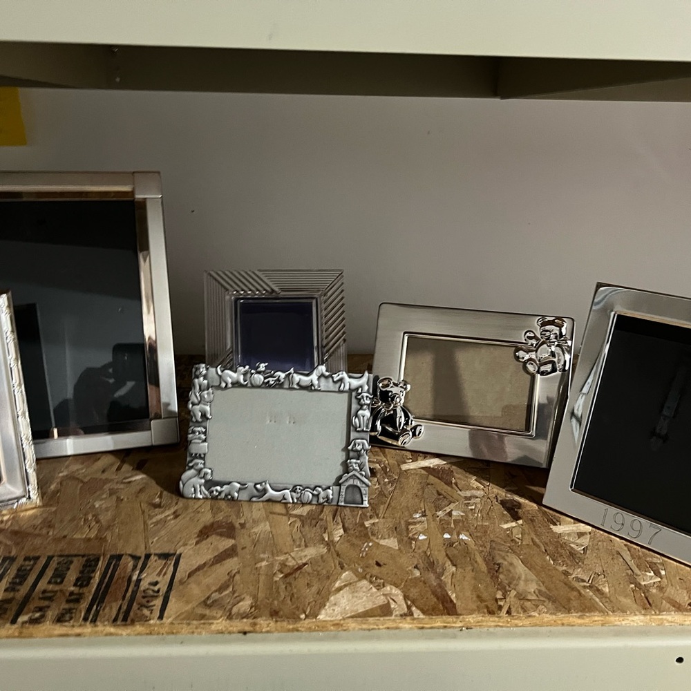 Set of 6 vintage silver photo picture frames including dog, bear, and 1997 frame